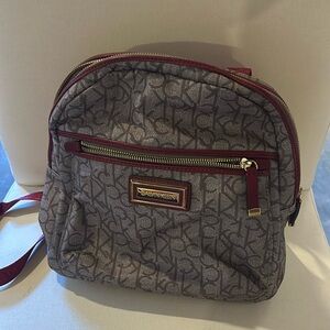 Calvin Klein backpack!!! Used but Like new. Tan and pink bag.